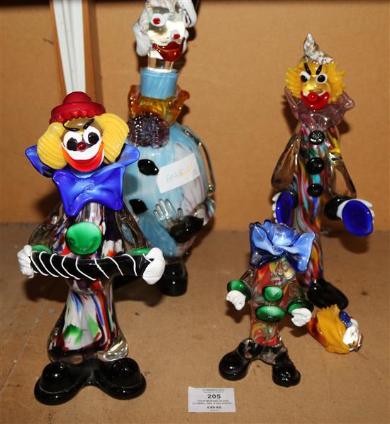 Four Murano glass clowns, one a decanter and stopper